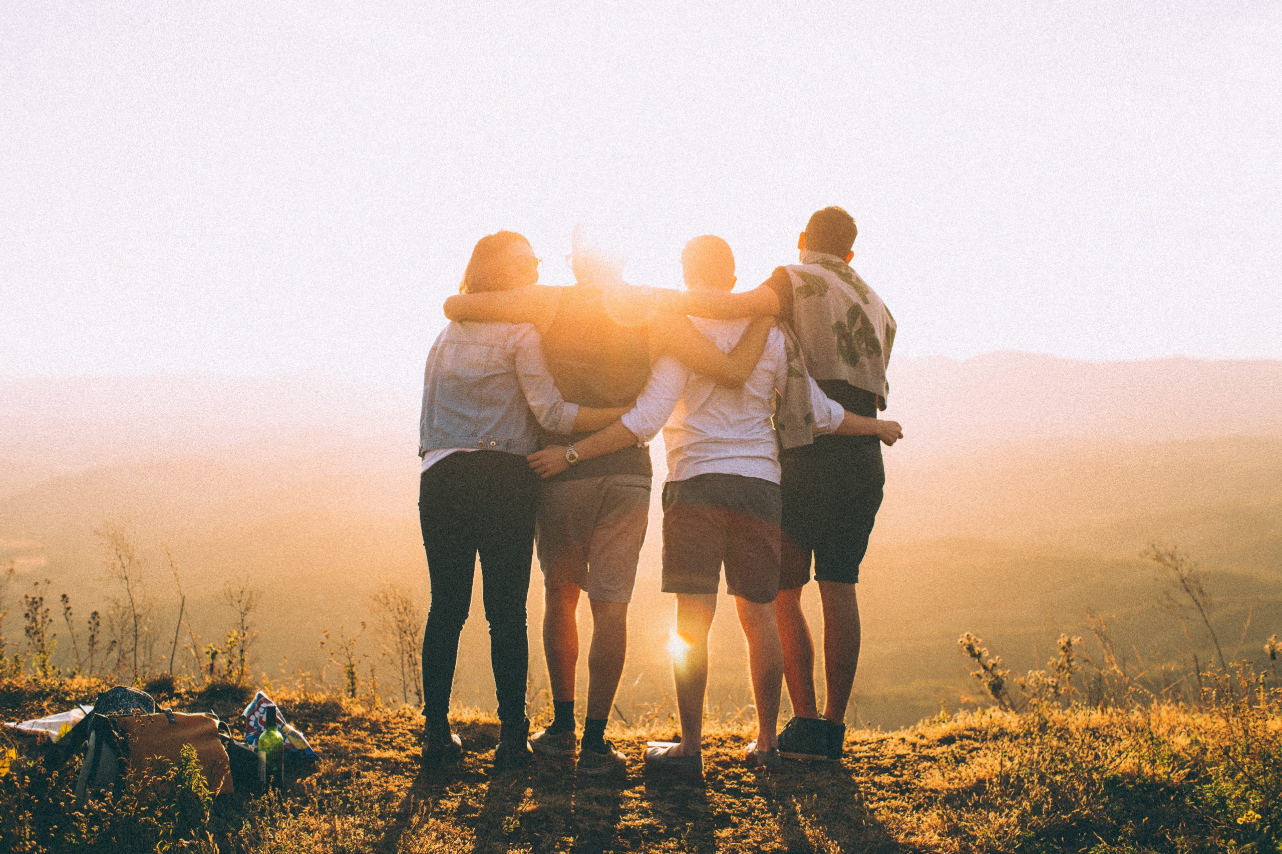 community - group of people hugging